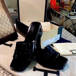 Gucci black slides gorgeous! Great for a night out. Worn twice. Fits like a 9